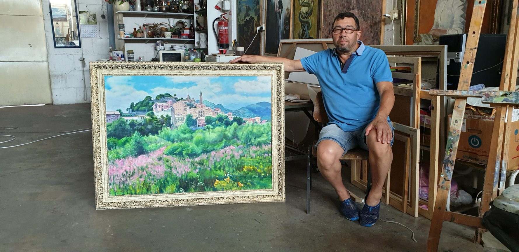 Evgeni Olentuch with his Painting